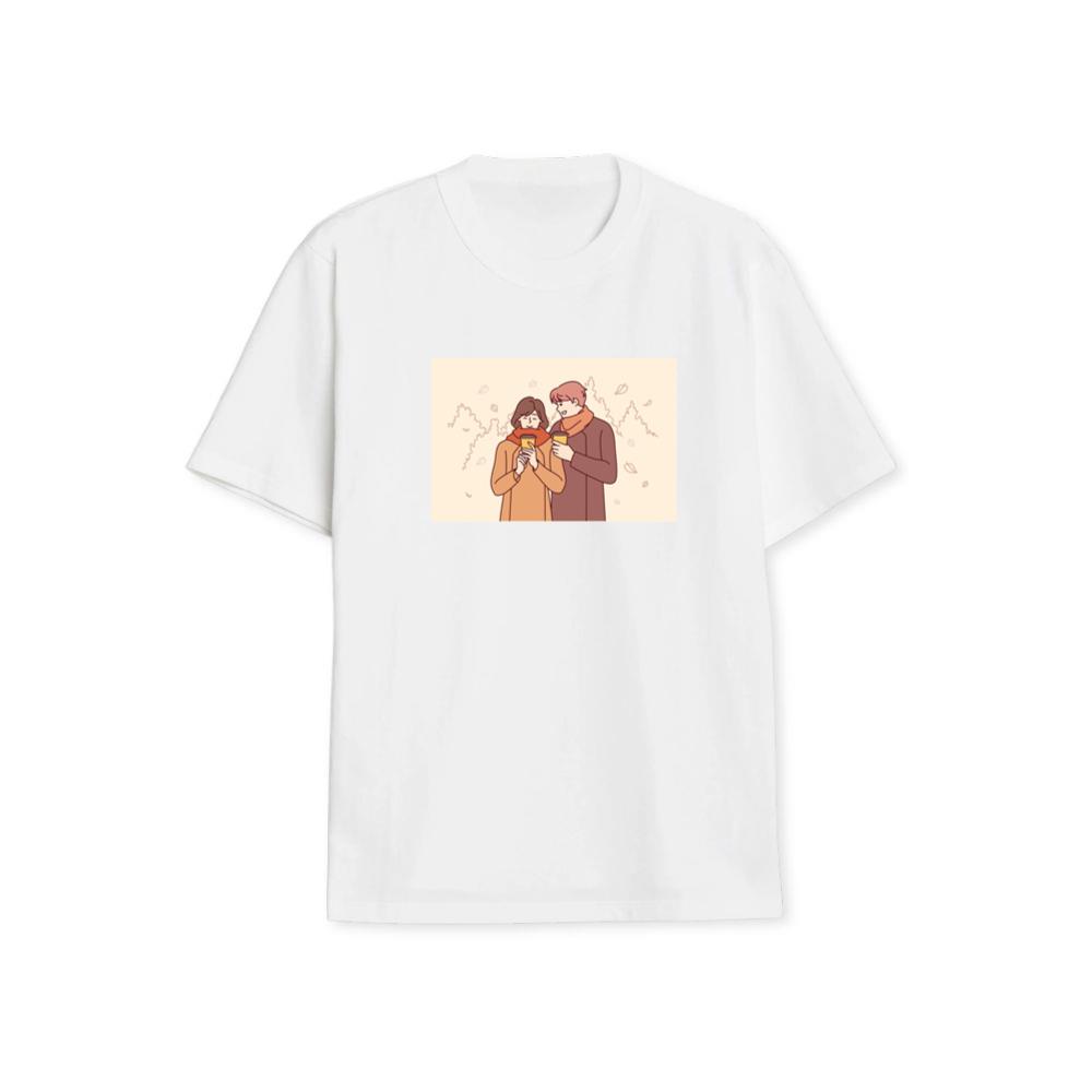 A Couple Enjoying a Cozy Moment Amidst Falling Leaves T-Shirts