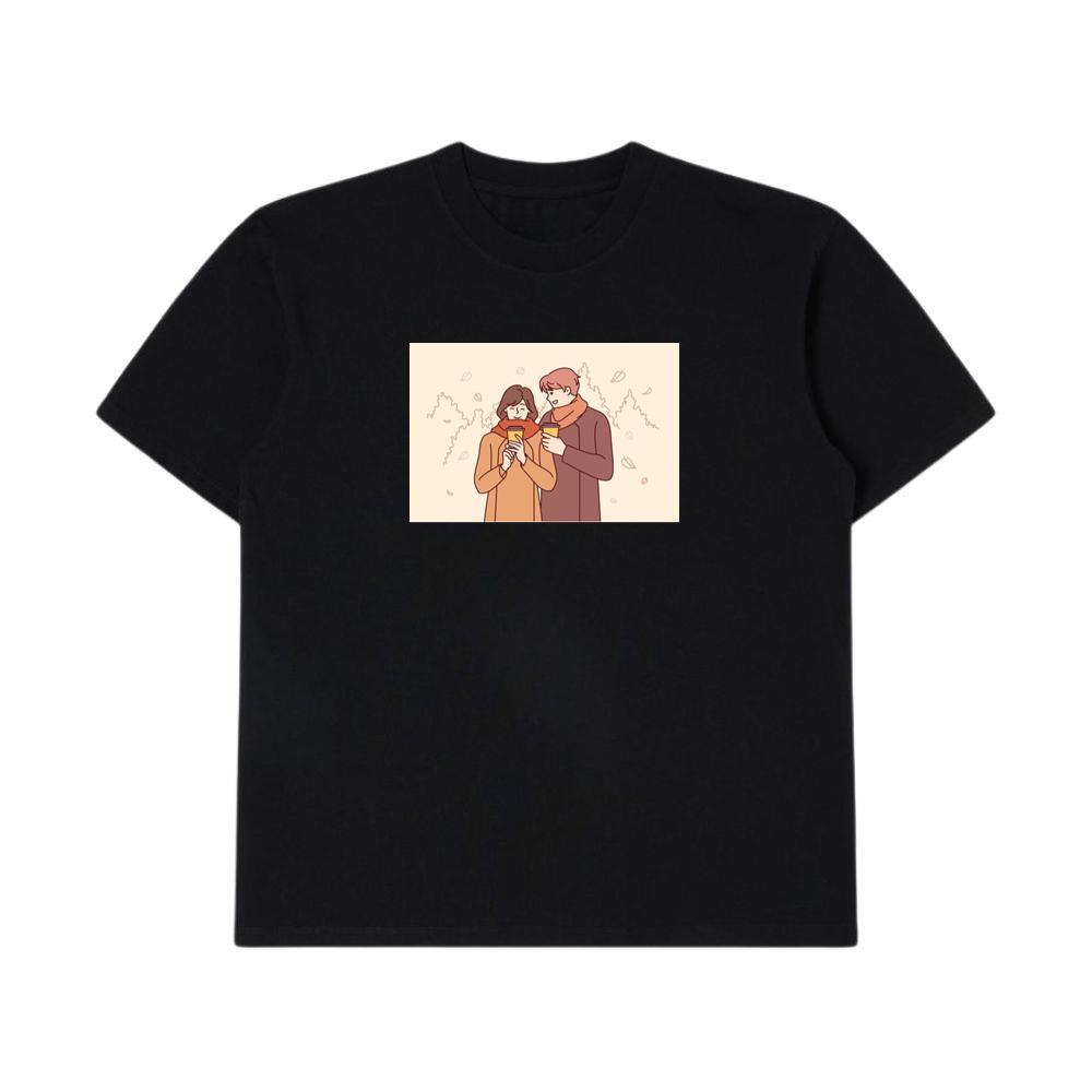 A Couple Enjoying a Cozy Moment Amidst Falling Leaves T-Shirts