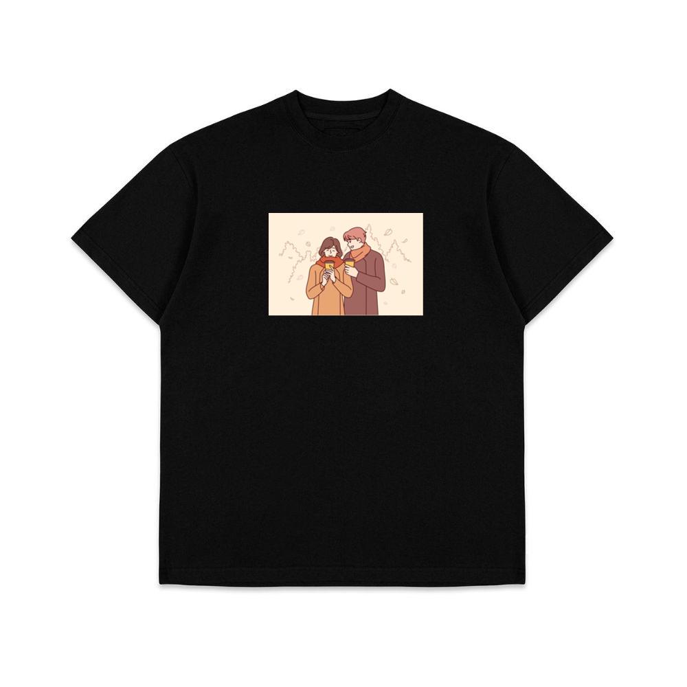 A Couple Enjoying a Cozy Moment Amidst Falling Leaves T-Shirts