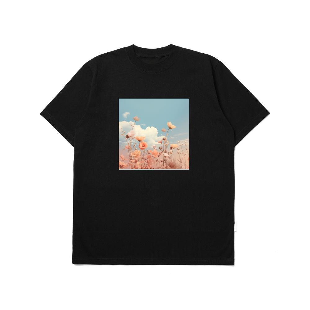 Delicate Flowers Reach Towards a Soft, Cloud-Scattered Sky T-Shirts