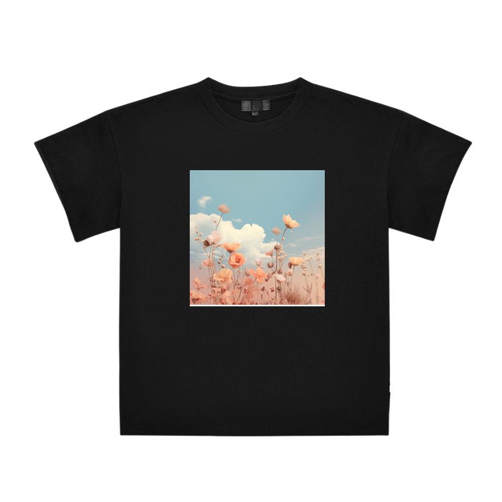 Delicate Flowers Reach Towards a Soft, Cloud-Scattered Sky T-Shirts