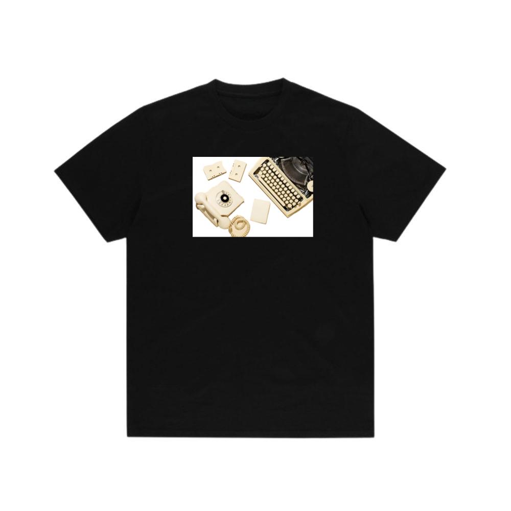 Vintage Yellow Telephone with Typewriter, Cassettes, and Paper T-Shirts
