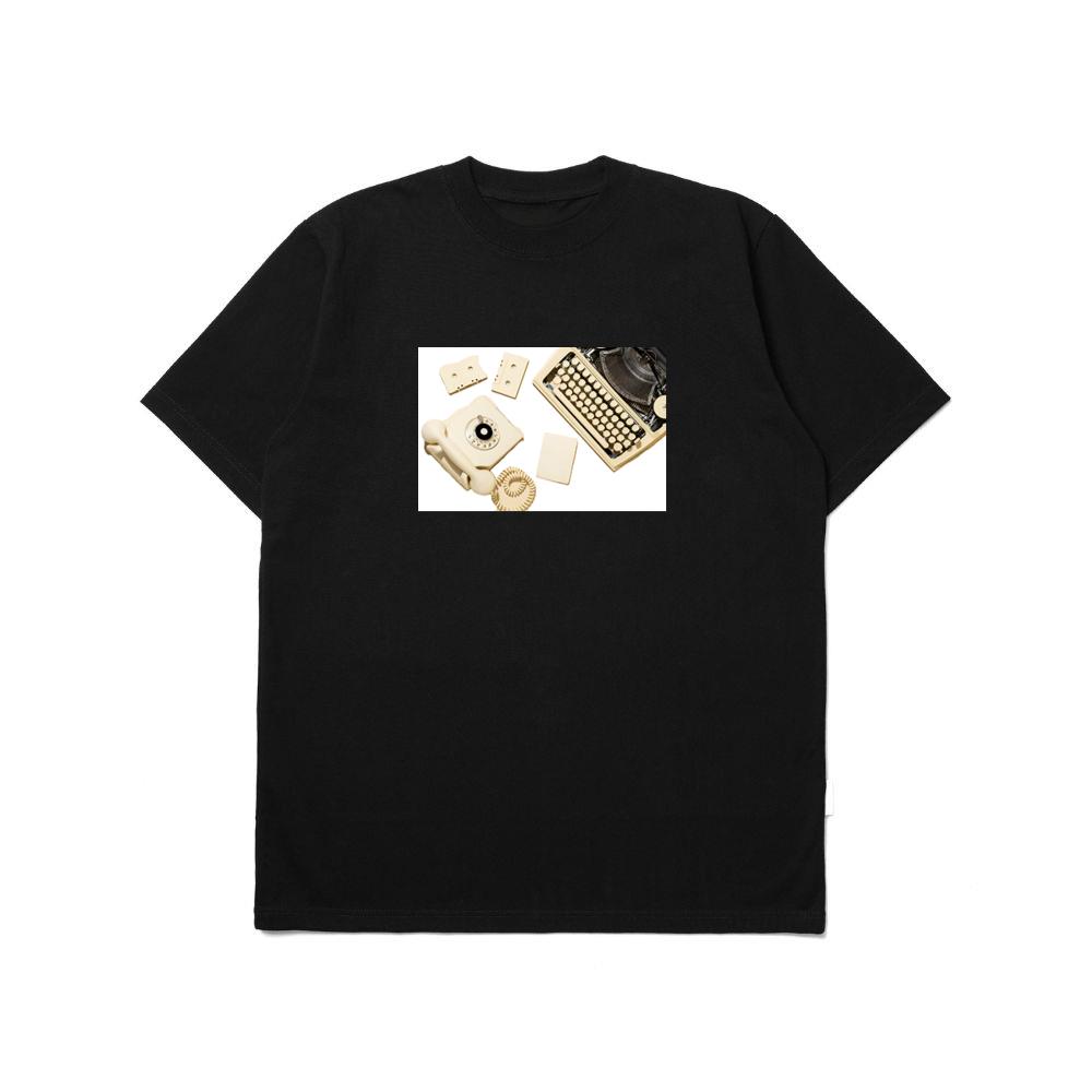 Vintage Yellow Telephone with Typewriter, Cassettes, and Paper T-Shirts