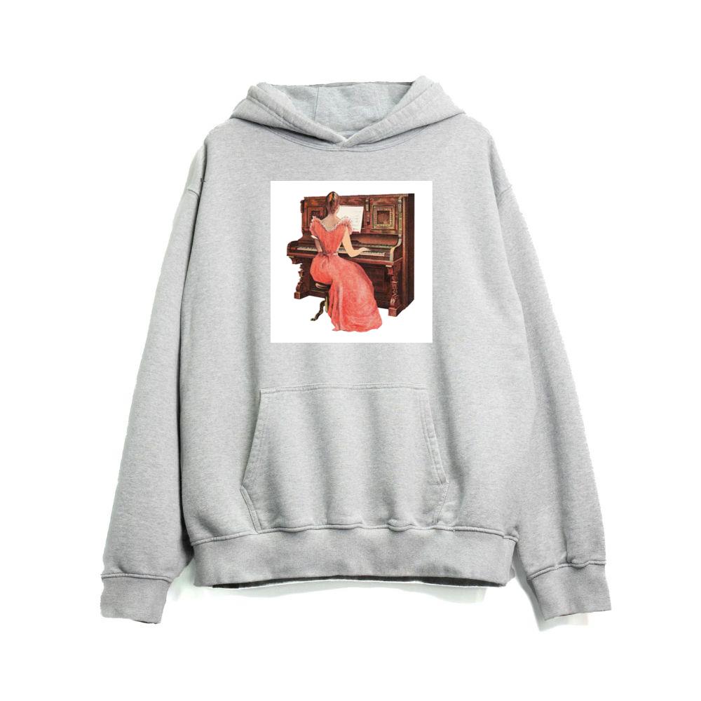 Woman in Pink Dress at Piano Hoodies