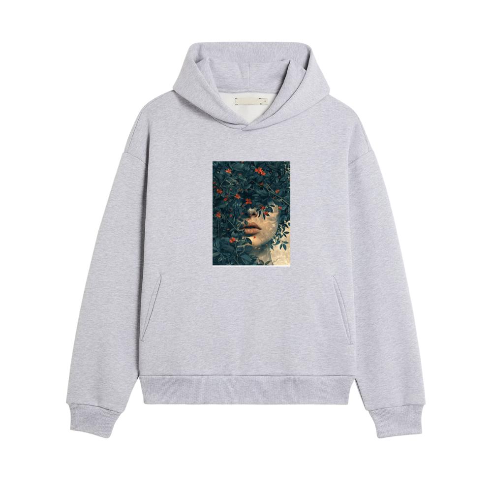 Woman's Face Among Leaves and Flowers Hoodies